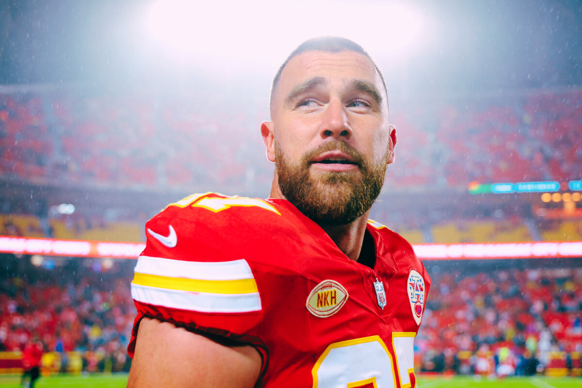 Travis Kelce of the Kansas City Chiefs on the field, looking focused during a game.