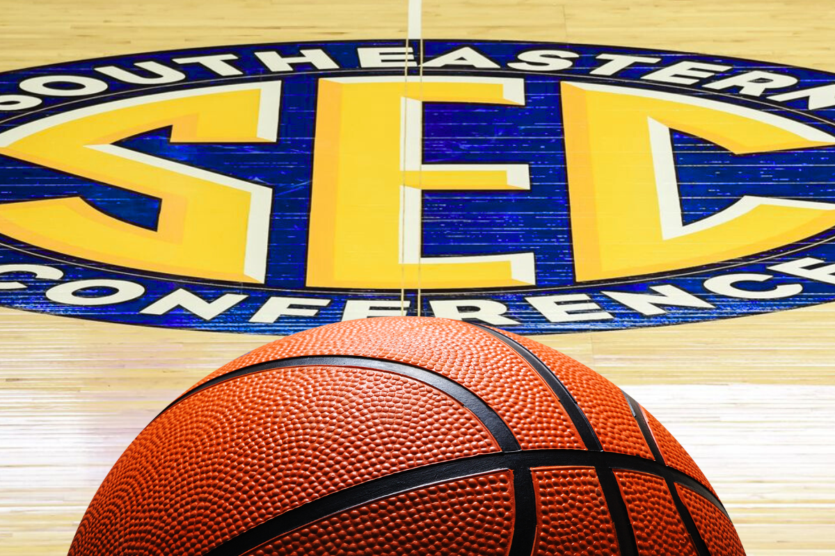 A close-up of a basketball on a court featuring the Southeastern Conference (SEC) logo at center court, symbolizing college basketball within the SEC.