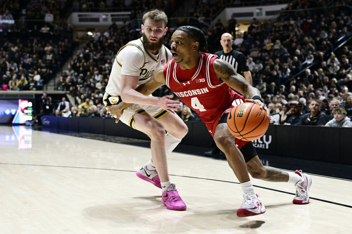 Purdue player getting ran by on defense